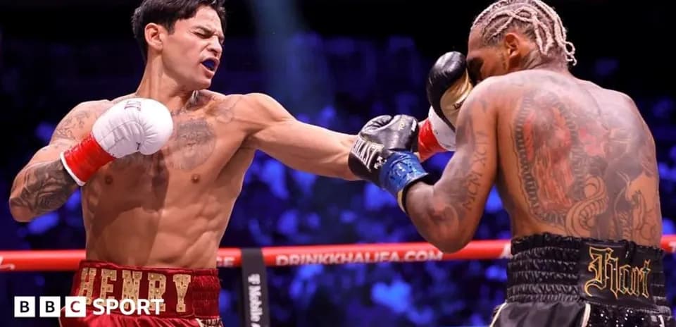 Boxers exchanging punches in the ring