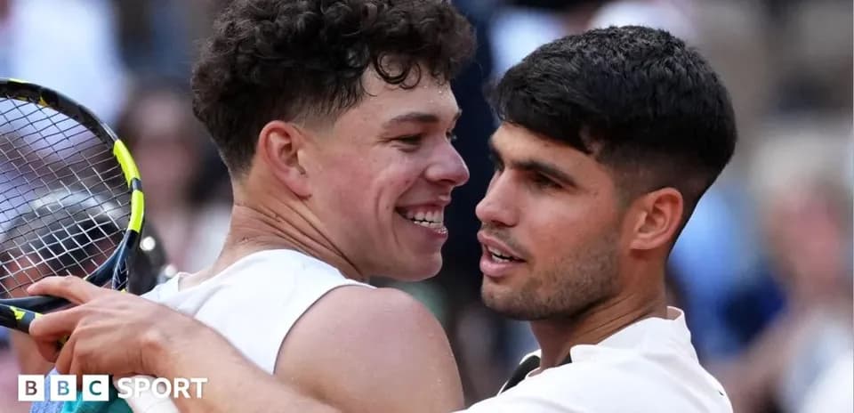Two tennis players embracing after a match