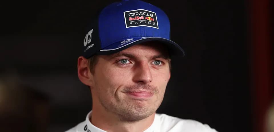 Driver wearing cap with Red Bull Racing logo
