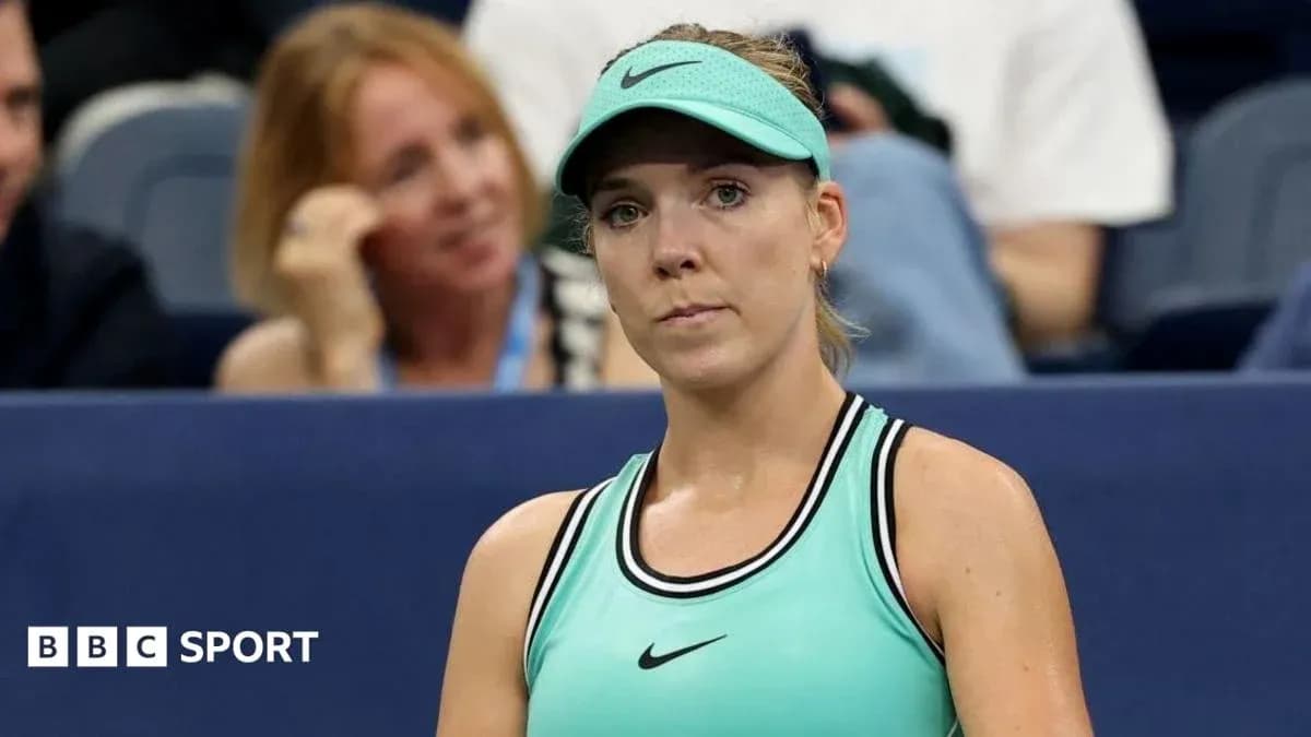 Tennis player in mint green attire during match
