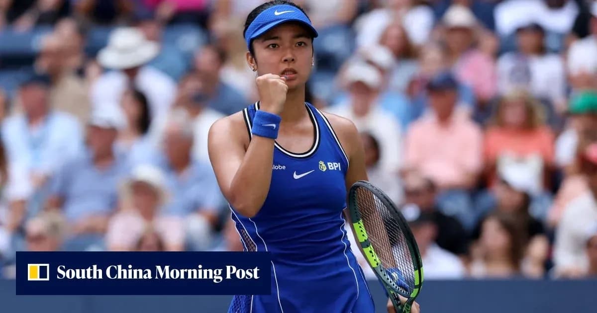 Tennis player celebrating during match at stadium