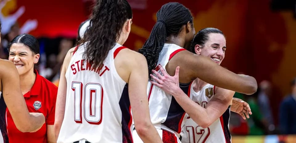 Players celebrating after a basketball match victory