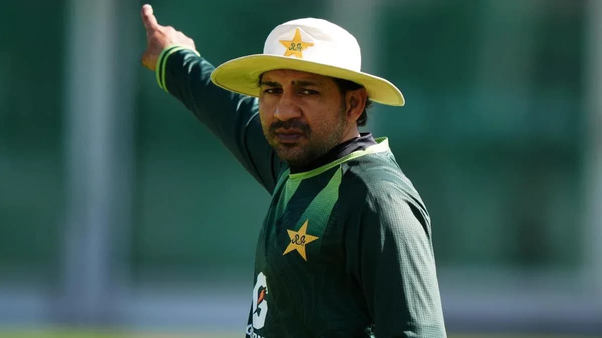 Cricketer gesturing during practice session