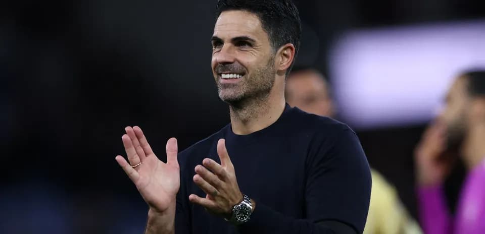Coach applauding during a match celebration