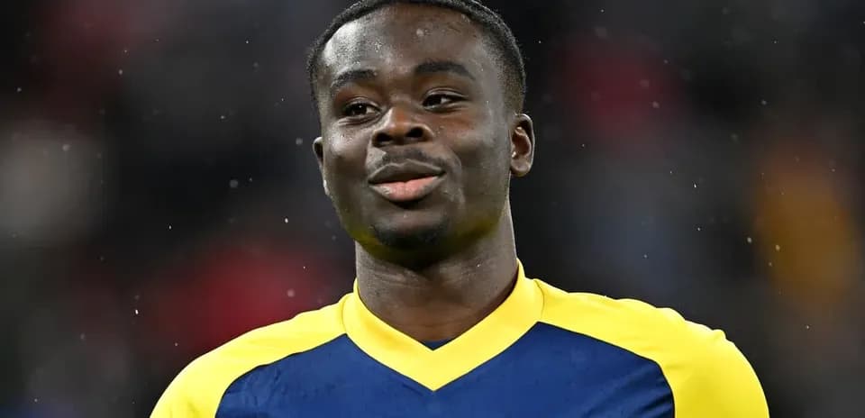Player wearing Arsenal jersey during match