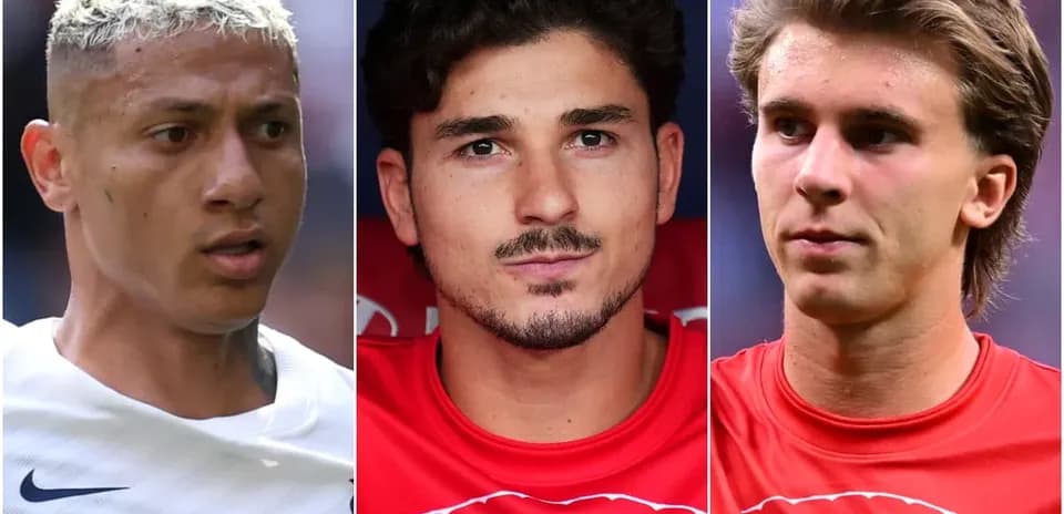 Three football players posing for a photo