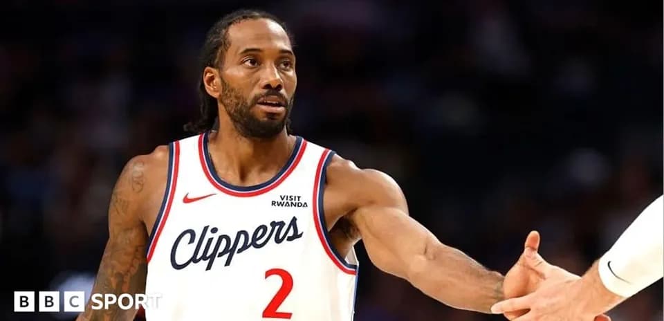 Player in Clippers jersey extending hand for handshake