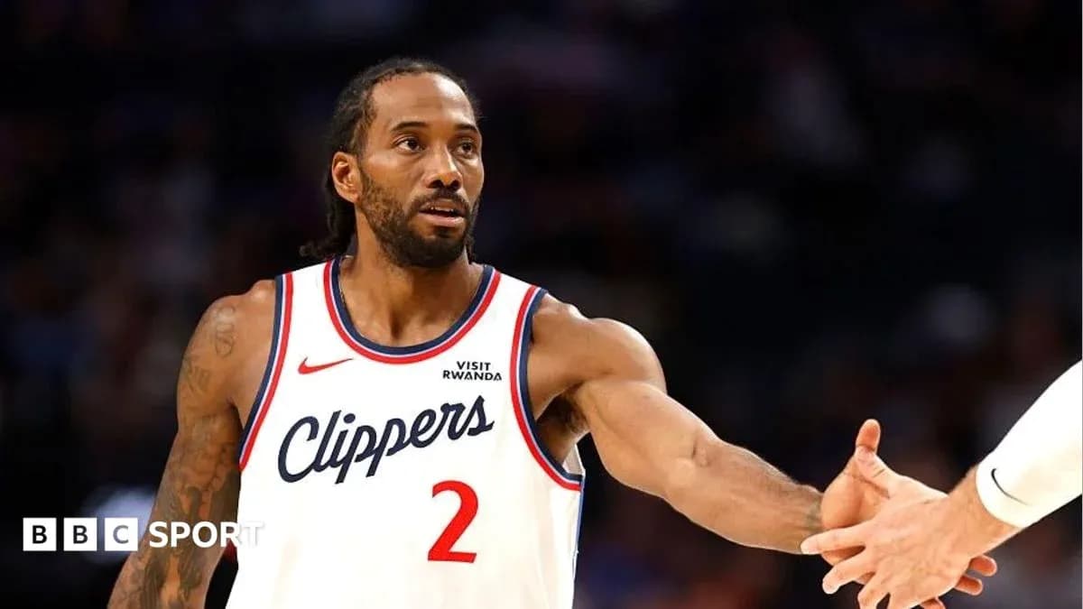 Player in Clippers jersey extending hand for handshake