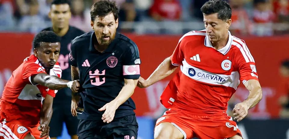 Players battling for the ball during a soccer match
