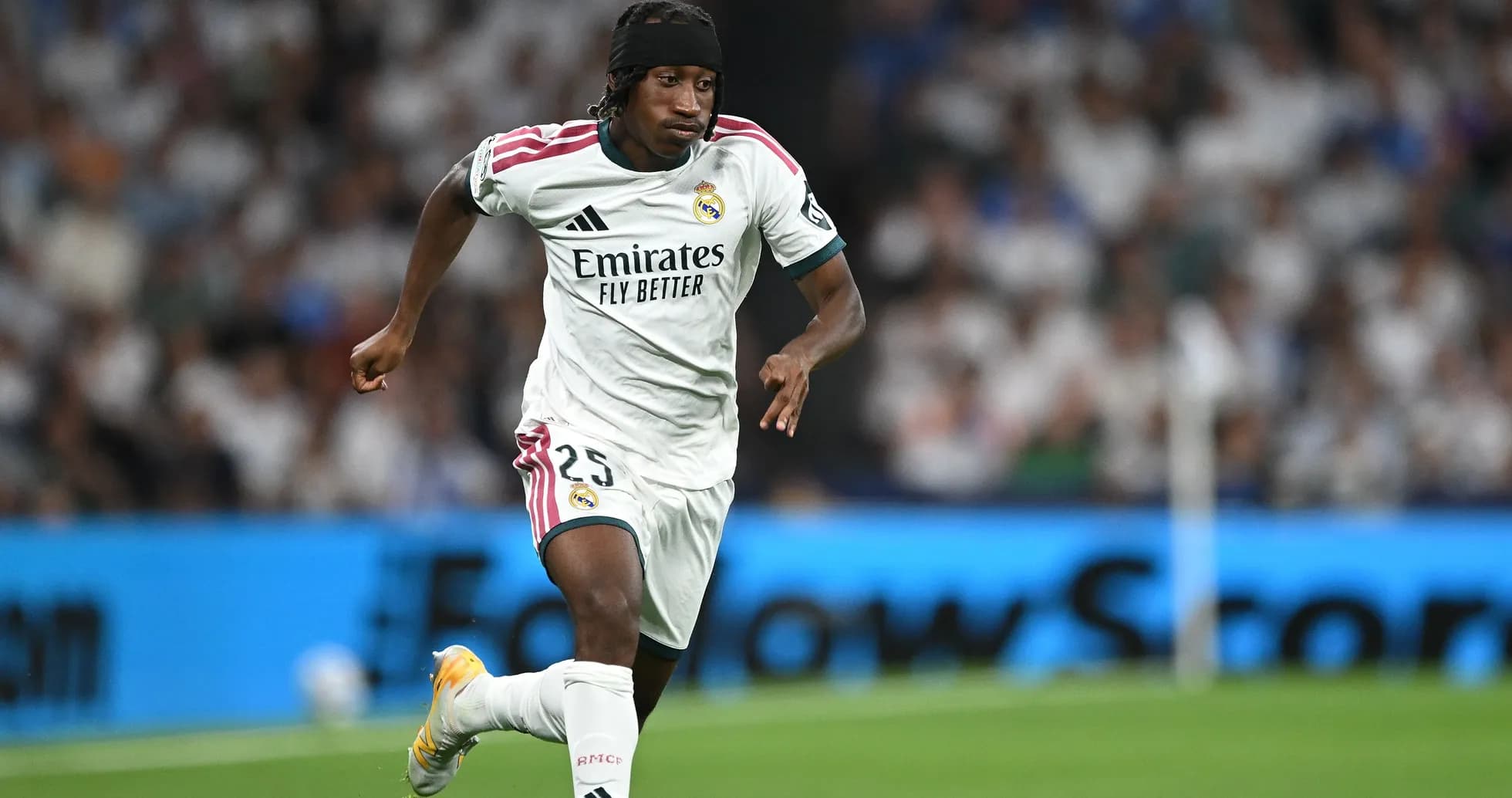 Player sprinting with the ball during match
