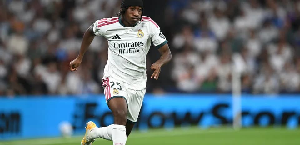 Player sprinting with the ball during match