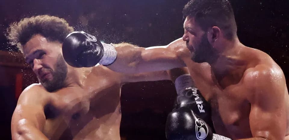 Boxers exchanging punches in the ring