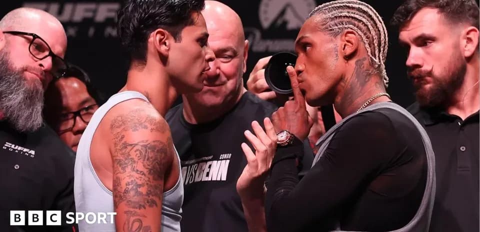 Two boxers face off during weigh-in event