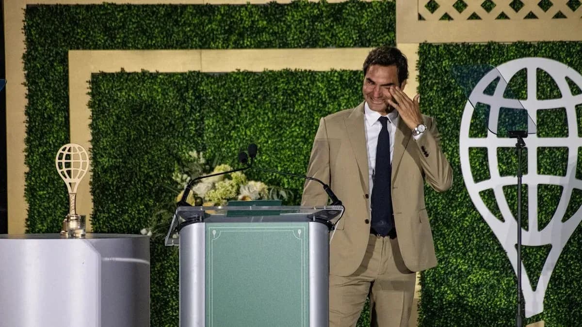 Roger Federer speaking at a podium during event