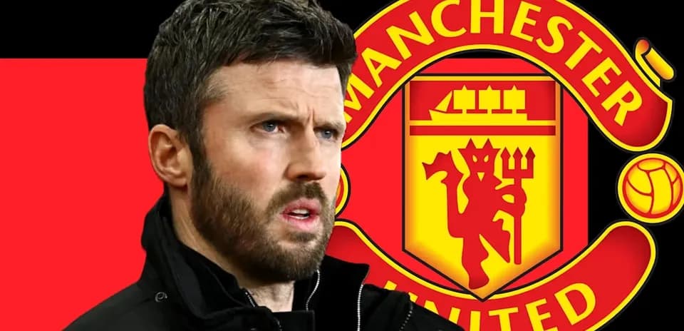 Man wearing a jacket with Manchester United logo behind