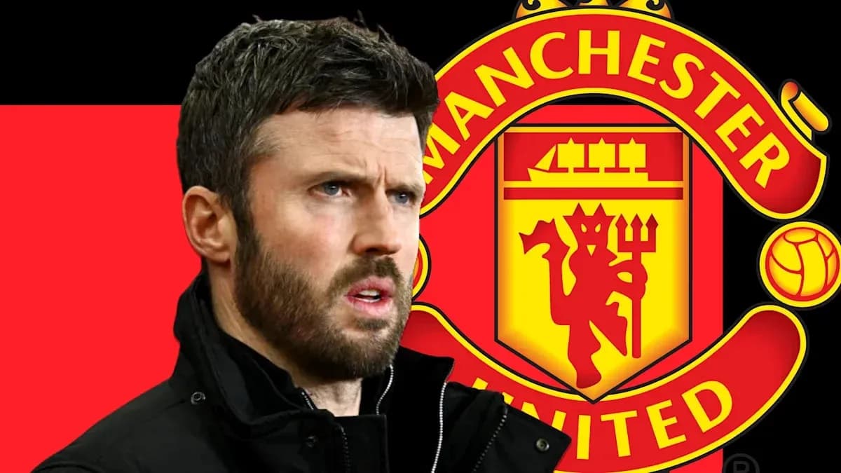 Man wearing a jacket with Manchester United logo behind