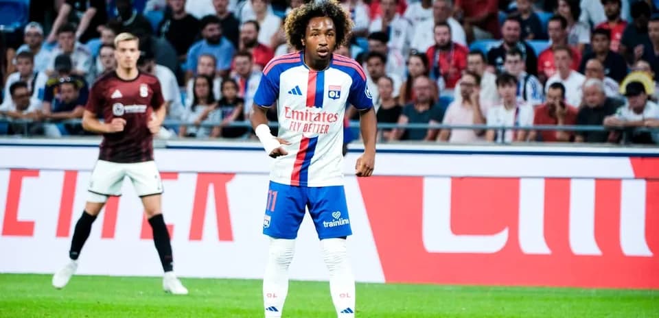 Player in Lyon kit during match on field