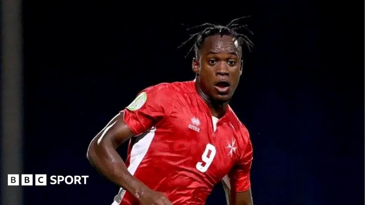 Player wearing red jersey during a match