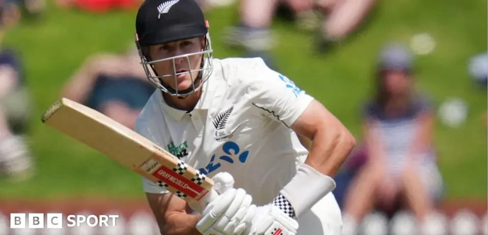 Cricketer batting during a match in the sun