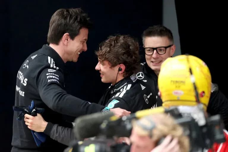 Team members celebrating after a successful race
