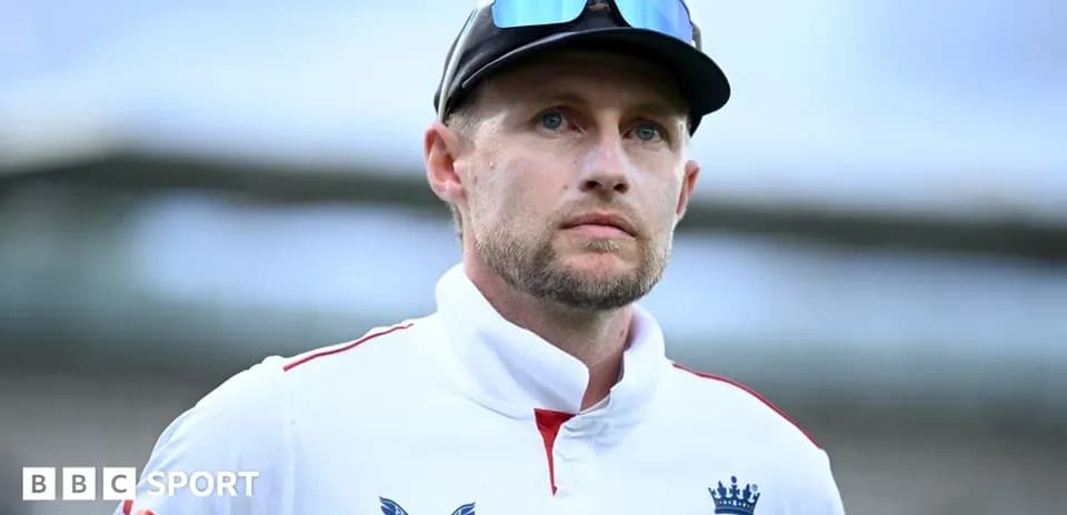 Cricketer wearing England kit and sunglasses outdoors