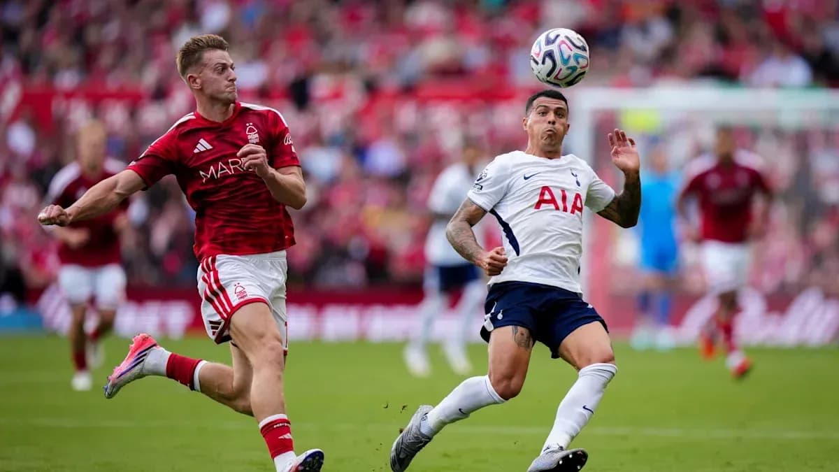 Player from Nottingham Forest chasing Tottenham player