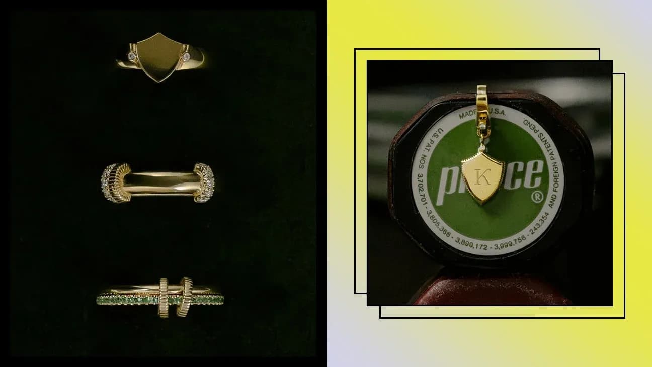 Various gold rings and a pendant on display