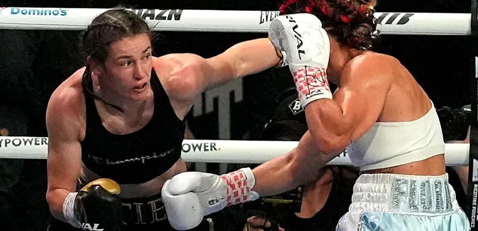 Boxers exchanging punches during a match