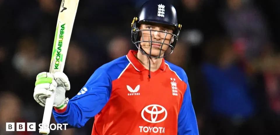 Batter celebrating with bat during cricket match