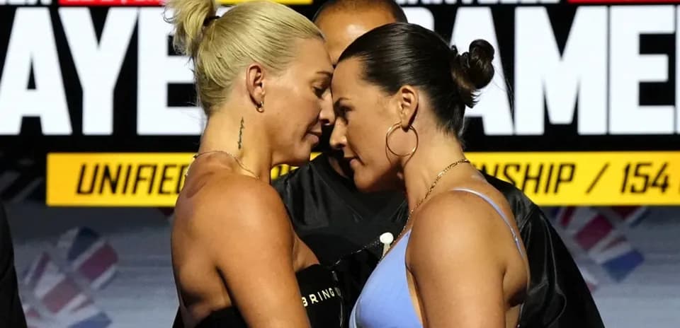 Two boxers face off during weigh-in event