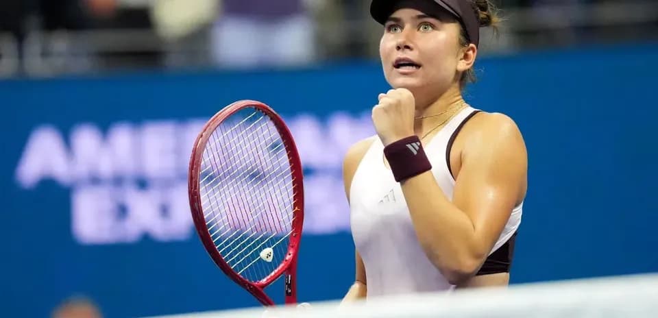 Tennis player celebrating during a match