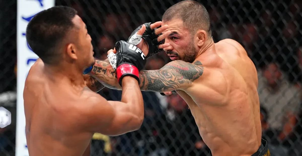 Fighters exchanging strikes during MMA match
