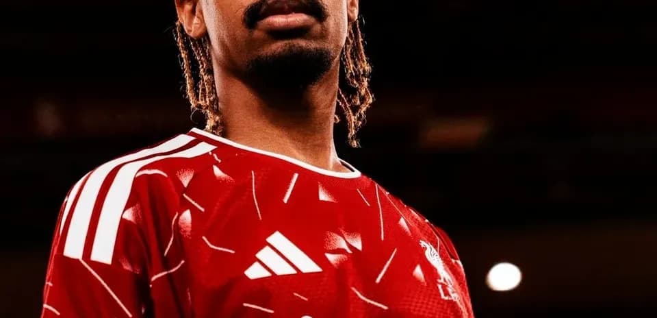 Player in red jersey posing for photo