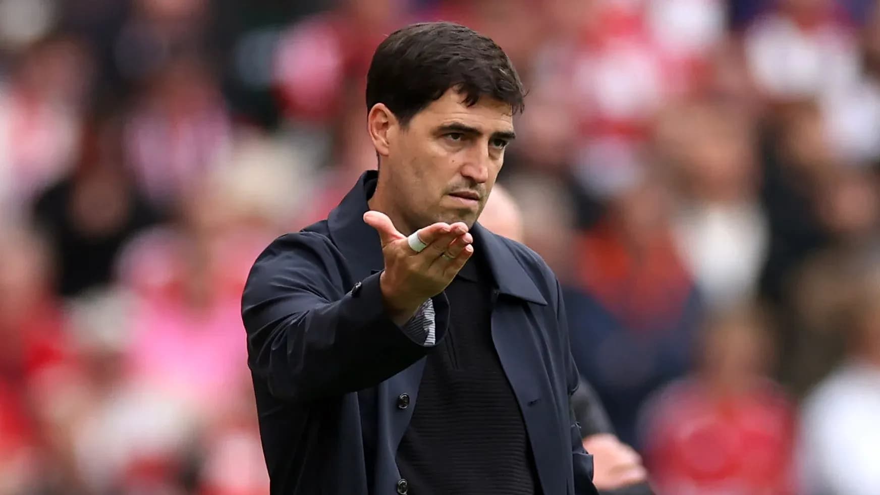 Manager giving instructions during a match