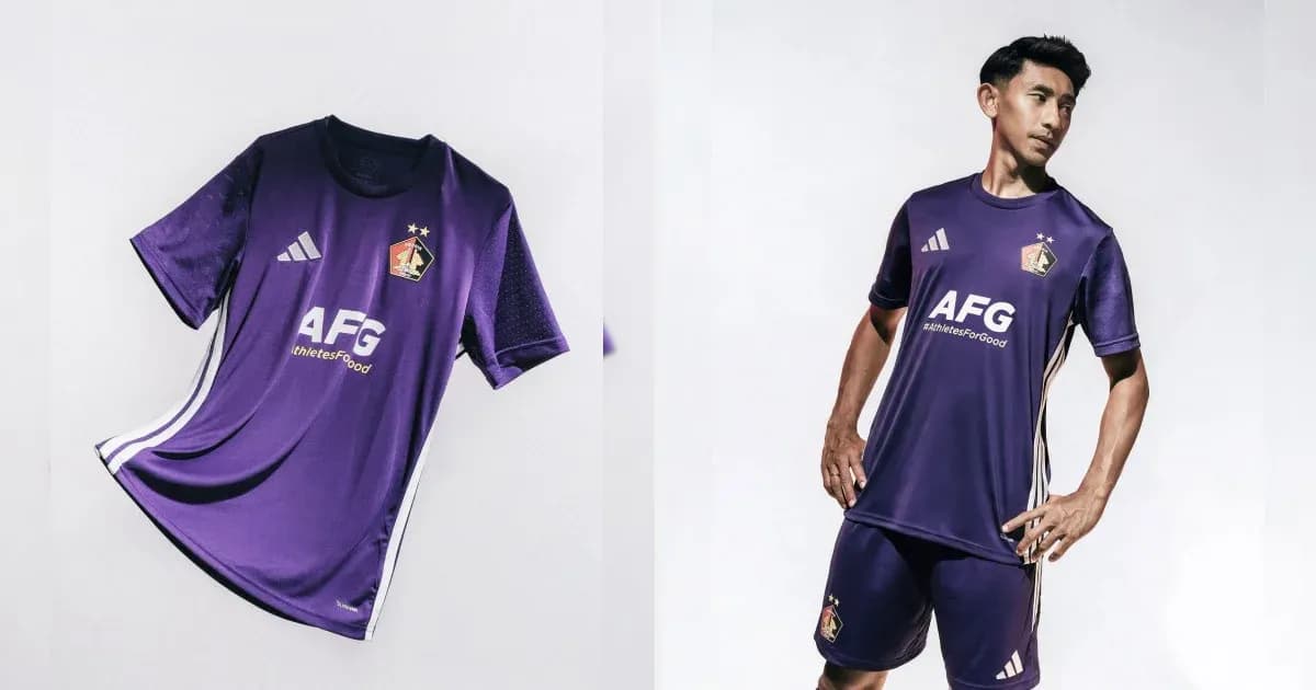 Purple football kit displayed on model and flat