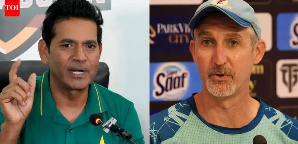 Two cricket coaches speaking at press conference