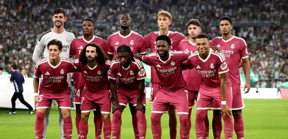 Real Madrid team posing for photo before match