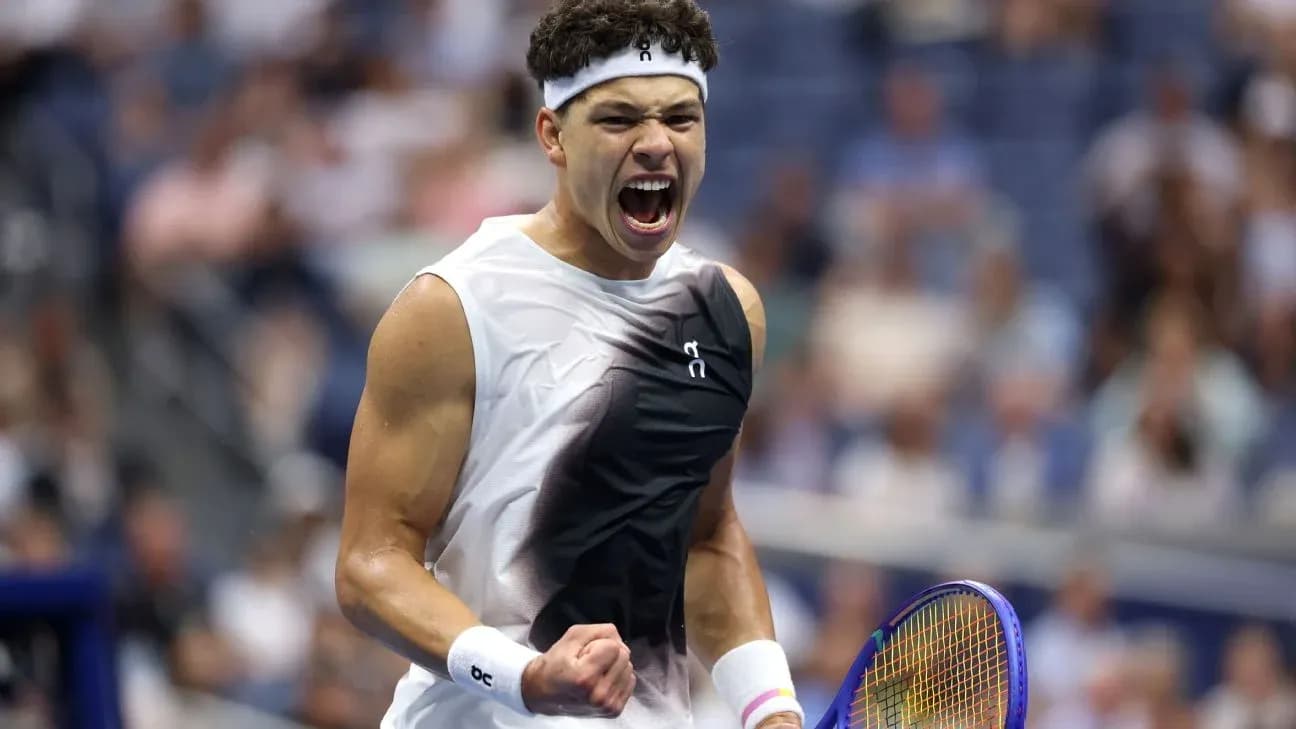 Tennis player celebrating after winning a point