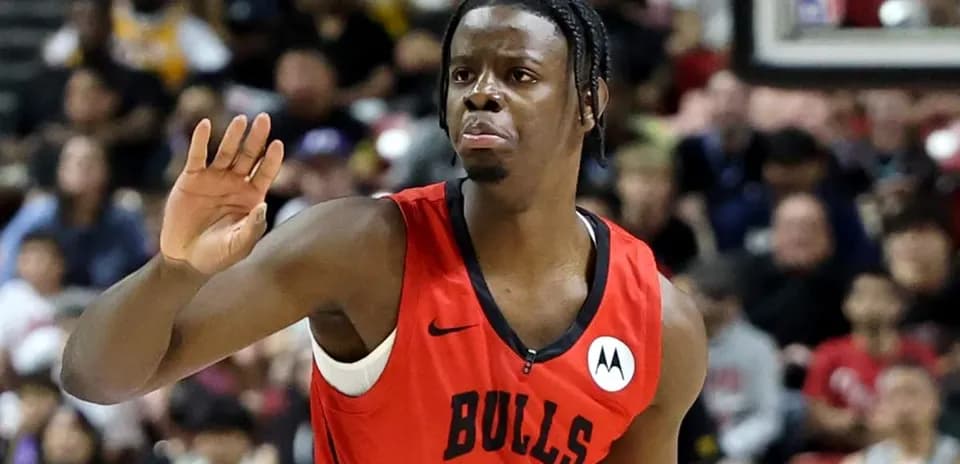 Player in Bulls jersey gesturing during game