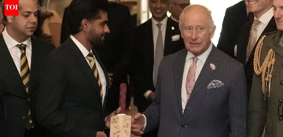 Babar Azam presenting signed bat to King Charles