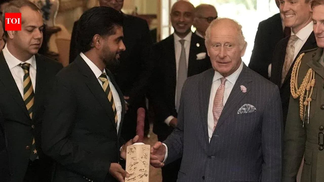 Babar Azam presenting signed bat to King Charles