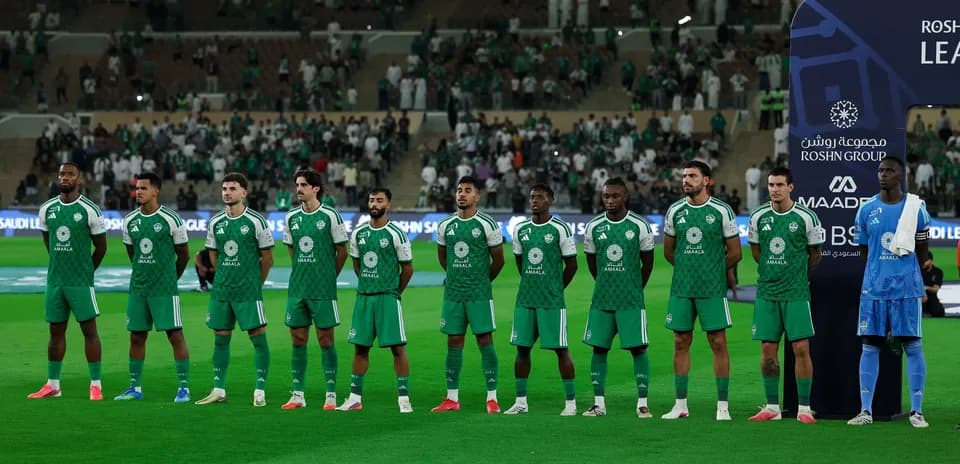 Football team lined up before match on field