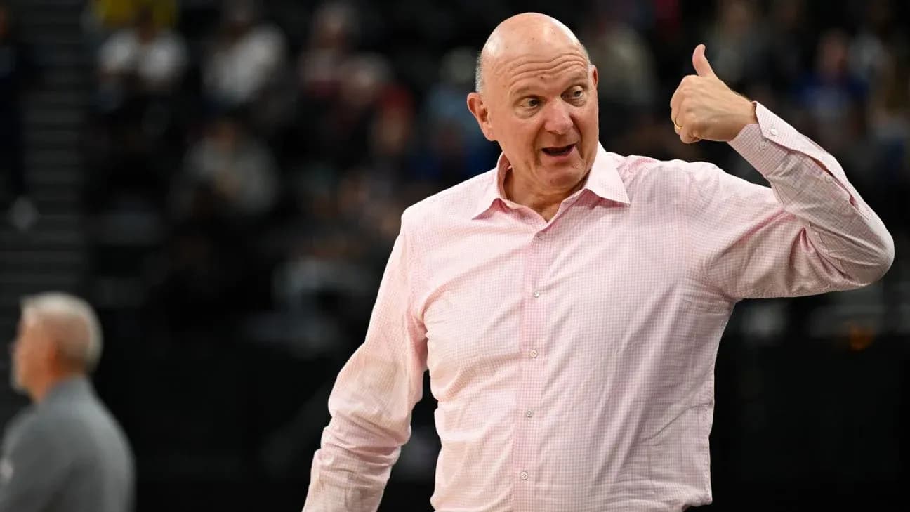 Man gesturing during basketball game at arena