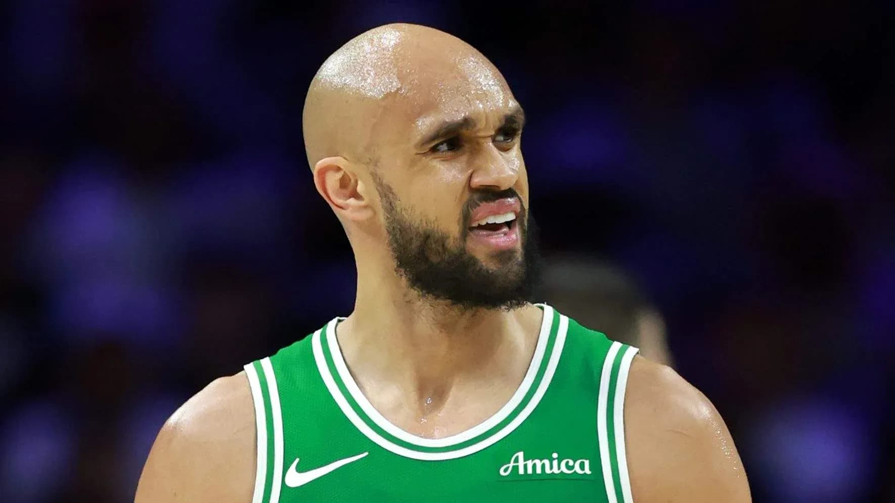 Player in green jersey during basketball game