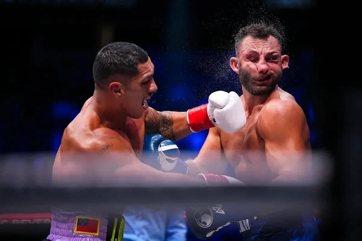 Boxers exchanging punches in the ring during match