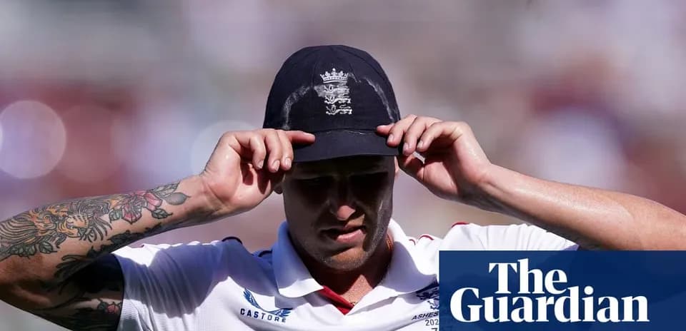 Cricketer adjusting cap during match under sunlight
