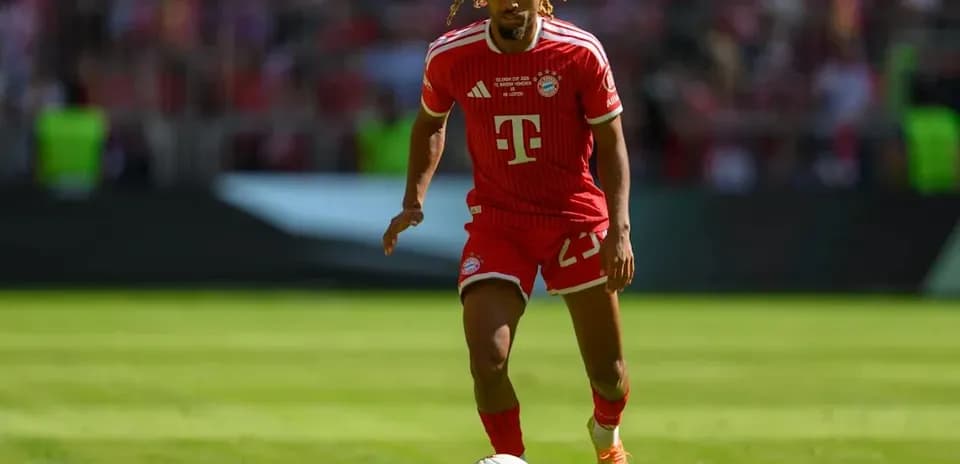 Player dribbling the ball on the pitch