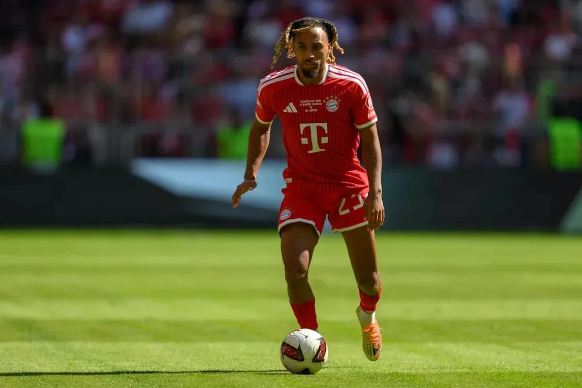 Player dribbling the ball on the pitch