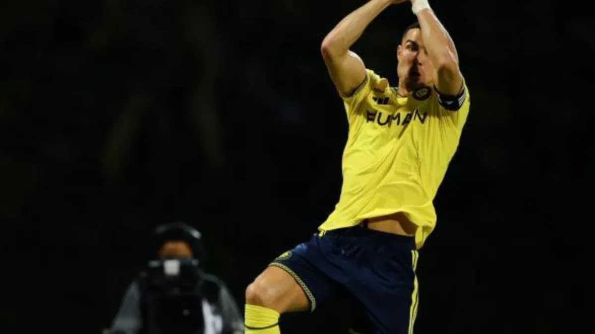 Player celebrating after scoring a goal in match