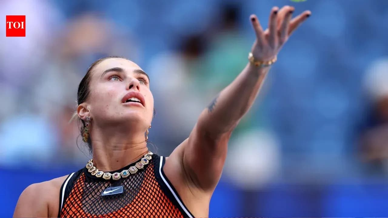 Tennis player serving during a match